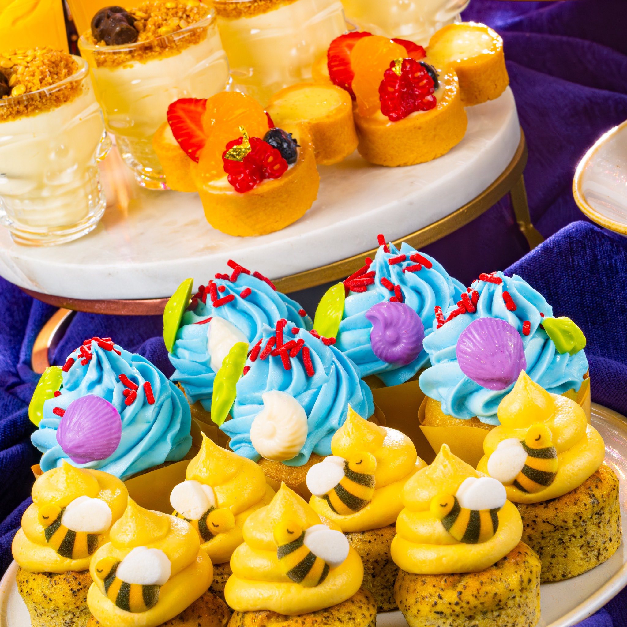 🍰✨ Sweet Surprises Await! New Land-Inspired Treats at Magic Kingdom’s Fireworks Dessert Party 🎆

Starting October 8, Disney is sprinkling even more sweetness into your night at Magic Kingdom’s Fireworks Dessert Party at the Tomorrowland Terrace Restaurant!

Guests can now indulge in an all-new lineup of land-inspired desserts — each treat celebrating one of Magic Kingdom’s beloved lands. Whether you’re watching the sky light up over Cinderella Castle or snapping your next sweet pic for the ‘gram, these new creations are as magical as the fireworks themselves.

🍫 Land-Inspired Delights You Can’t Miss

✨ Star Command Mousse Cup (Tomorrowland) – A galactic swirl of chocolate and vanilla mousse topped with a space-worthy crunch. Buzz Lightyear would totally approve! 🚀
🍑 Bayou Peach Cobbler (Frontierland) – Warm, golden cobbler filled with juicy peaches and a sprinkle of southern charm straight from the bayou. 🌙
🧀 Country Bear Cheesecake (Frontierland) – Creamy, dreamy cheesecake with a berry topping that’s sure to make you clap your paws! 🐻
🍎 Fantasyland Apple Tart – A flaky, fairytale-perfect pastry fit for a princess, complete with shimmering sugar dust. 🍏
🍰 Main Street Vanilla Bean Cake Bites – Sweet, simple, and picture-perfect — the perfect companion to a front-row fireworks view. 🎇

These desserts are available as part of the Magic Kingdom Fireworks Dessert Party at Tomorrowland Terrace, where guests can enjoy exclusive seating, sweet treats, and a sparkling view of the nightly fireworks spectacular.

So grab your plate, pick your favorite flavor, and make your night extra magical — because fireworks taste even better with a side of Disney dessert! 💫