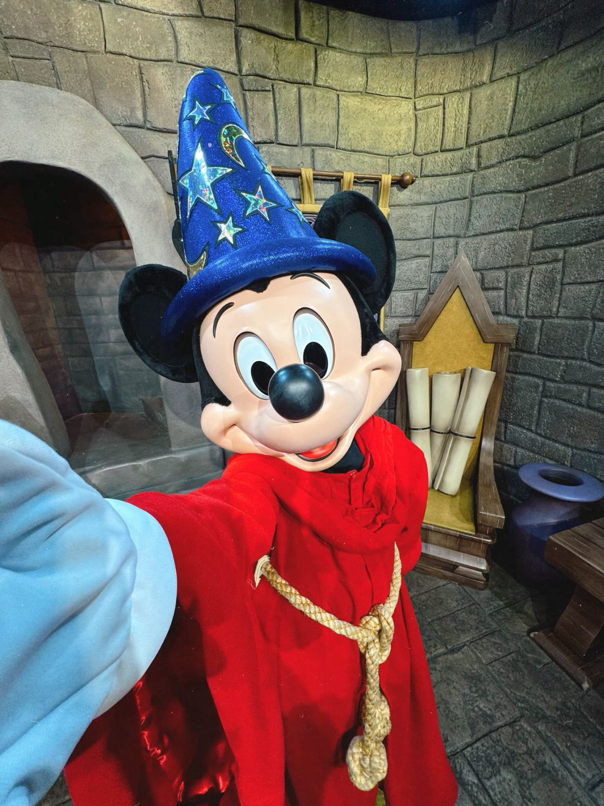 Mickey Mouse taking a selfie means phones at Disney will not go away.